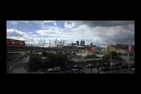 Interchange, east London panorama with ocean liner the 02 Dome, trains, and building sites.Exteriors